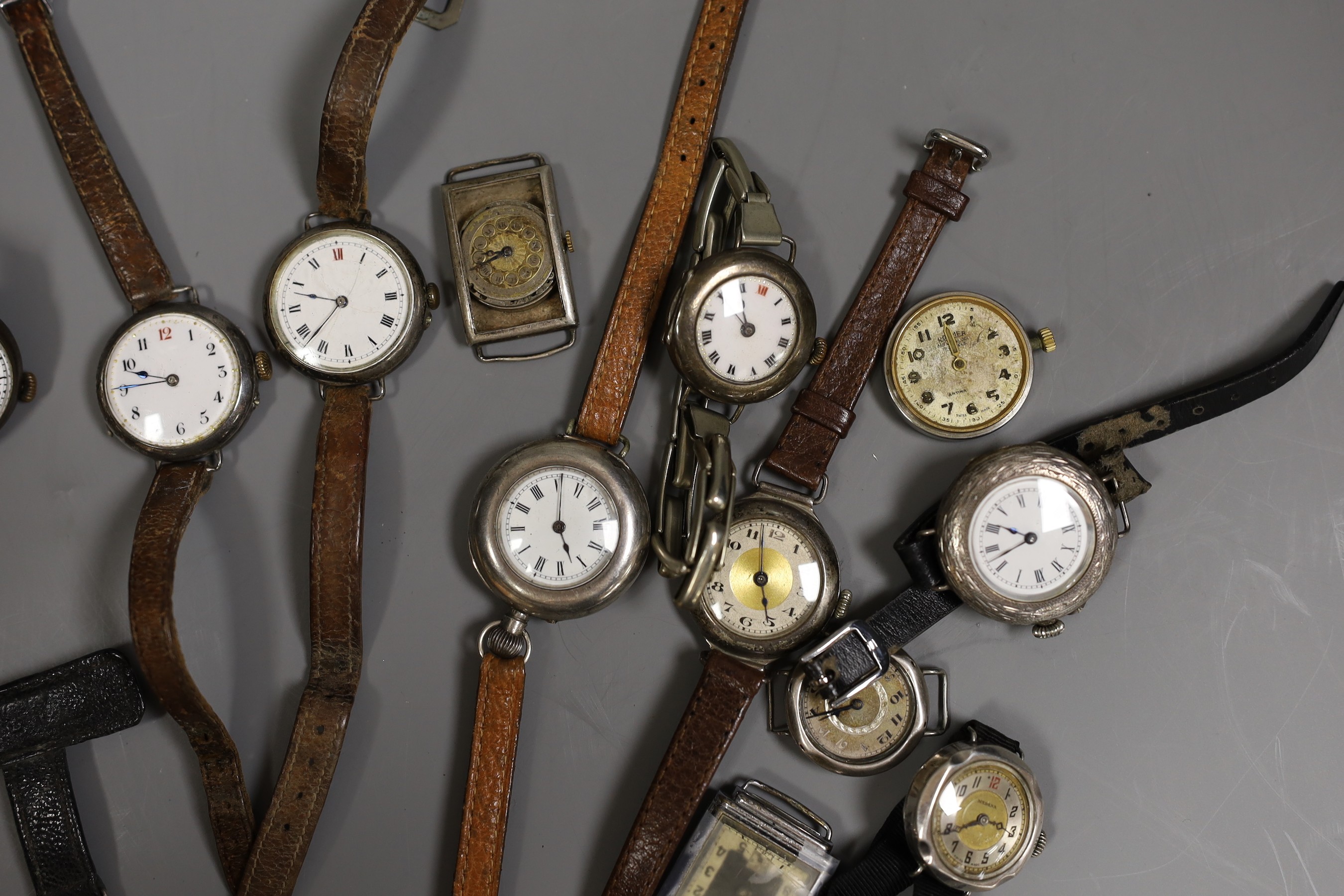 A small collection of ten assorted early 20th century wrist watches including trench style and seven other wrist watches (a.f.).